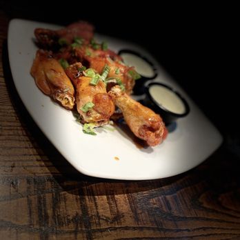 Local Goat - Sriracha Honey Wings. - New American Near Me - Pigeon Forge, Tennessee Local Goat - Sriracha Honey Wings. - New American Near Me - Pigeon Forge, Tennessee