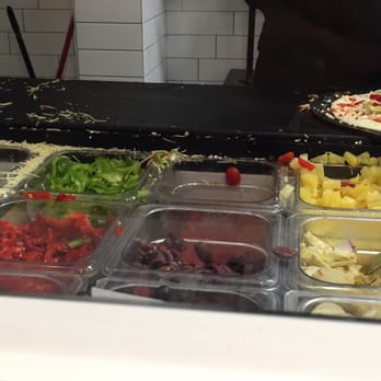 The Pizza Press - Toppings all over the place, this doesn't capture all of it. - Salad Near Me - Orange, California The Pizza Press - Toppings all over the place, this doesn't capture all of it. - Salad Near Me - Orange, California