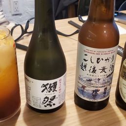 Thai Iced Tea ($4.99), Dassai 45 ($25.99), Koshi Hikari Echigo ($11.99), Kyoto White Yuzu Ale ($11.99) Thai Iced Tea ($4.99), Dassai 45 ($25.99), Koshi Hikari Echigo ($11.99), Kyoto White Yuzu Ale ($11.99)
