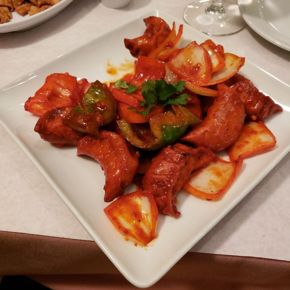 Pork Chilli Momo, dumplings with onion and bell pepper Pork Chilli Momo, dumplings with onion and bell pepper