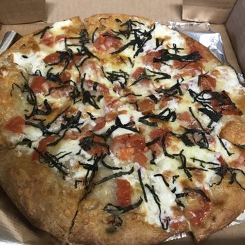 The Root Cafe - $12.00 The Freshy Pizza -  fresh garlic & olive oil with fresh red bell peppers, provolone & fresh mozzarella topped with fresh basil. - Coffee & Tea Near Me - Lakewood, Ohio