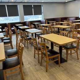 Clean, but sparse sit-down area Clean, but sparse sit-down area