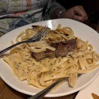 Outback Steakhouse - Kingsland Pasta, grilled steak and shrimp over fettuccine tossed in bold Alfredo sauce. - Steakhouses Near Me - Wilton, Connecticut