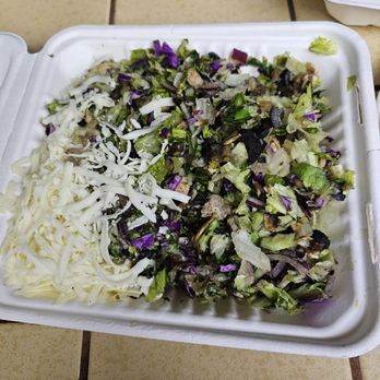 Beach Pizza - Dark, limp and unappetizing greens, nice serving of cheese. - Italian Near Me - Westchester, California Beach Pizza - Dark, limp and unappetizing greens, nice serving of cheese. - Italian Near Me - Westchester, California