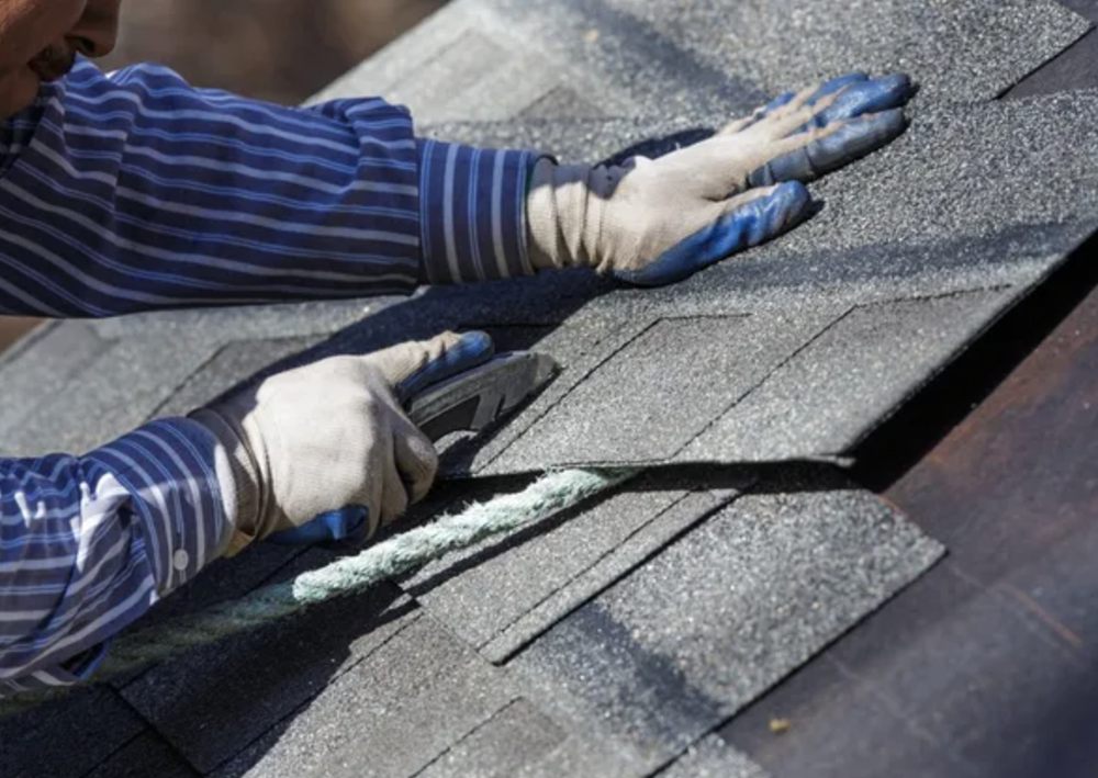 Slide of Akurate Roofing Group