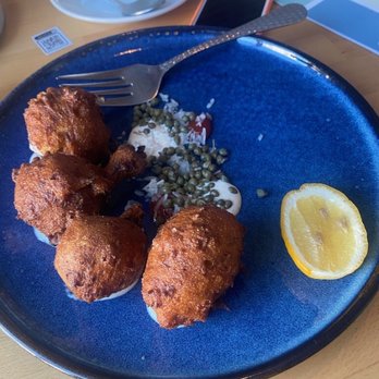 Nina May - Hush puppies, part of chef's experience - New American Near Me - Washington, DC, District of Columbia Nina May - Hush puppies, part of chef's experience - New American Near Me - Washington, DC, District of Columbia