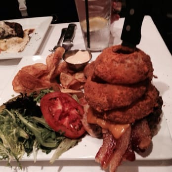 The Union Kitchen - The Union Burger. Yes, those are huge onion rings and certified Angus Beef. - New American Near Me - Kingwood, Texas The Union Kitchen - The Union Burger. Yes, those are huge onion rings and certified Angus Beef. - New American Near Me - Kingwood, Texas