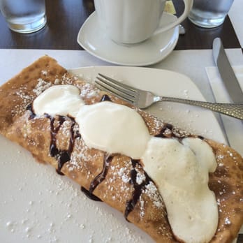 Bitton Bistro Cafe - Banania crepe with banana and Nutella, topped with whipped cream. - Creperies Near Me - Islamorada, Florida Bitton Bistro Cafe - Banania crepe with banana and Nutella, topped with whipped cream. - Creperies Near Me - Islamorada, Florida