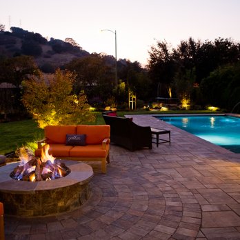 Lifescape Custom Landscaping - a patio with a fire pit - Lighting Fixtures & Equipment Near Me Lifescape Custom Landscaping - a patio with a fire pit - Lighting Fixtures & Equipment Near Me