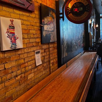 Stray Dog - a bar with a long wooden table - New American Near Me - Minneapolis, Minnesota Stray Dog - a bar with a long wooden table - New American Near Me - Minneapolis, Minnesota