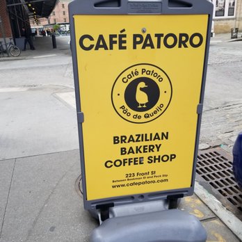 Cafe Patoro - Sidewalk signs, shop is in the middle of the block. - Bakeries Near Me - New York, New York
