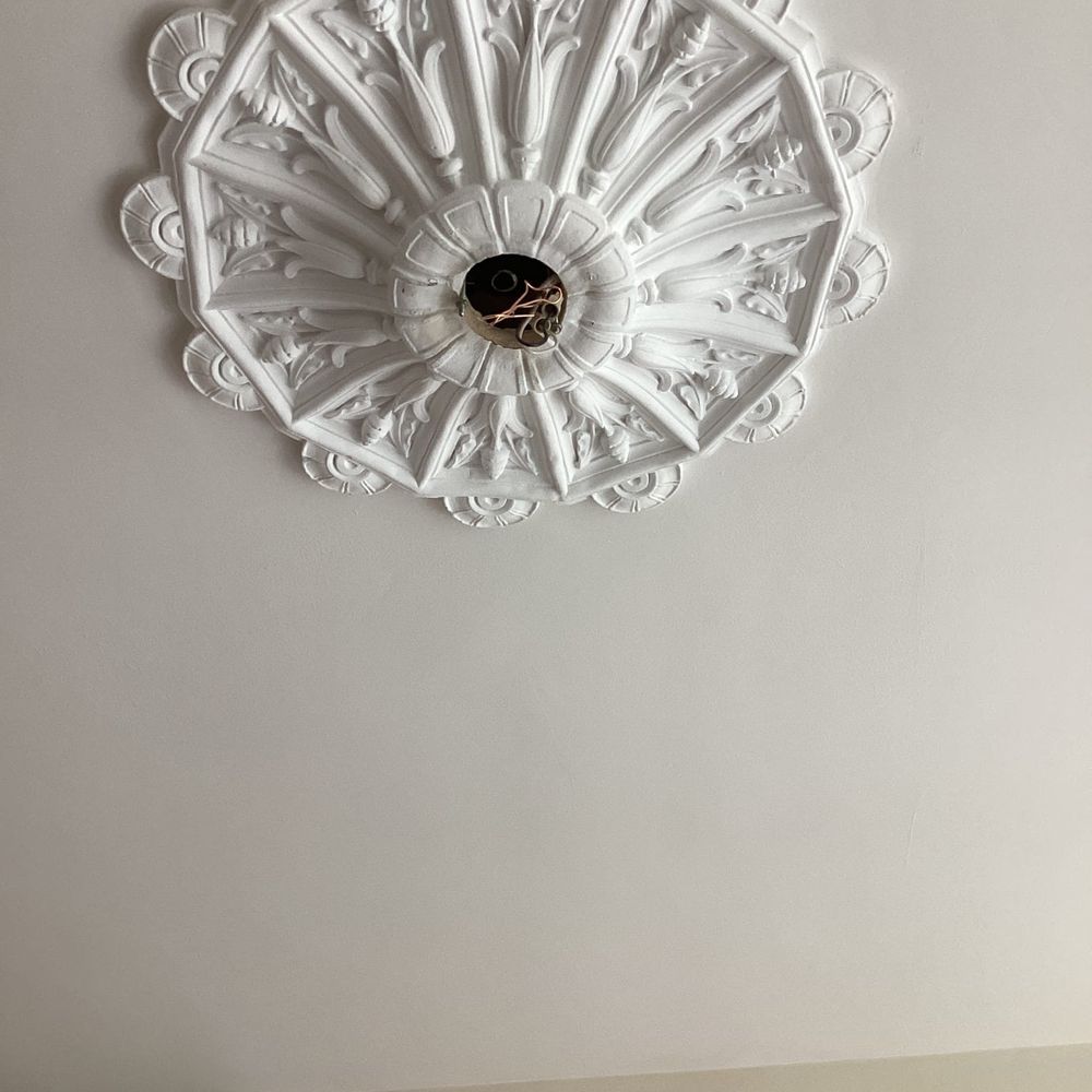 Pipe removed from within medallion. Pipe removed from within medallion.