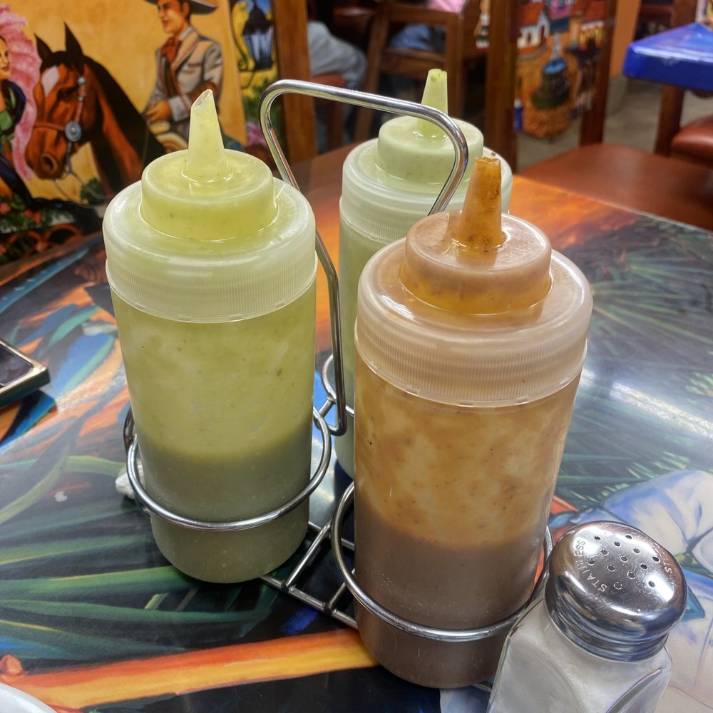 Tacos El Nevado - Hot sauces on the table - Mexican Near Me - Charlotte, North Carolina