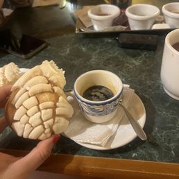 This is a conchita (complementary), and an expresso This is a conchita (complementary), and an expresso