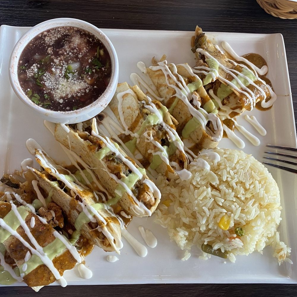 Tequila's Waterfront - Fajita Quesadilla with Chicken, black beans and rice - Mexican Near Me - Wilmington, North Carolina Tequila's Waterfront - Fajita Quesadilla with Chicken, black beans and rice - Mexican Near Me - Wilmington, North Carolina