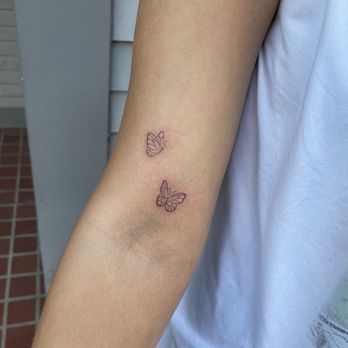 Tempest Tattoos - Two butterflies in memory of her Nana. - Tattoo Near Me - Milwaukee, Wisconsin