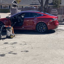 Car coming out of tunnel being dried. Car coming out of tunnel being dried.