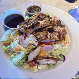 Grilled Chicken Salad no potato straws with balsamic dressing. Best he's ever had he said. Grilled Chicken Salad no potato straws with balsamic dressing. Best he's ever had he said.
