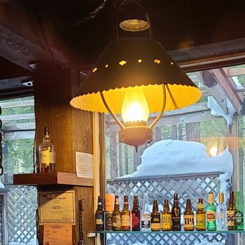 The Steam Donkey - a bar with a lot of bottles - American Near Me - Pinecrest, California