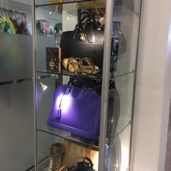 Roundabout Designer Closeouts & Consignments - Louis Vuitton glass case