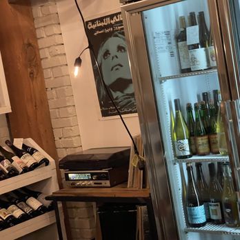 Cafe Suliman - Wine shelves and music station - Arabic Near Me - Seattle, Washington