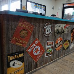Chad Miller Auto Care - The retro tin signs at the check-in desk.