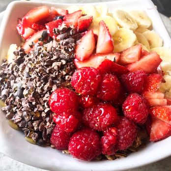 Earthbar - Massive acai bowl!!! Topped with cacao bitters, honey, banana, strawberry, and raspberry! - Juice Bars & Smoothies Near Me - La Costa, California Earthbar - Massive acai bowl!!! Topped with cacao bitters, honey, banana, strawberry, and raspberry! - Juice Bars & Smoothies Near Me - La Costa, California