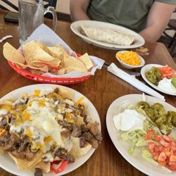 El Taquito Mexican Restaurant - Beef fajita nachos, burrito supreme.