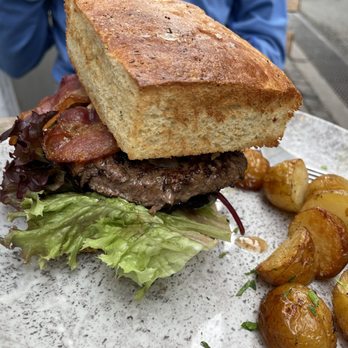 Restaurant Tight - Tight's Wagyu Burger Homemade focaccia bread, patty of Danish Wagyu, onions, aioli, mushrooms, Emmental, bacon and potatoes - Danish Near Me - København K, 84 Restaurant Tight - Tight's Wagyu Burger Homemade focaccia bread, patty of Danish Wagyu, onions, aioli, mushrooms, Emmental, bacon and potatoes - Danish Near Me - København K, 84