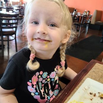 Krave Restaurant-Bridgeview - My niece, enjoying her K pancake and "dip" eggs. - American Near Me - Bridgeview, Illinois