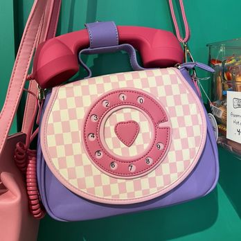 Sticky Fingers - Telephone purse with a real phone attached. - Candy Stores Near Me - Grand Rapids, Michigan Sticky Fingers - Telephone purse with a real phone attached. - Candy Stores Near Me - Grand Rapids, Michigan