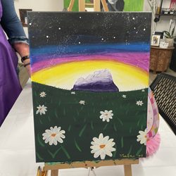 Lost in the Woods Art Gallery - Picture our group selected- A view of snow capped mountains from a field of flowers.