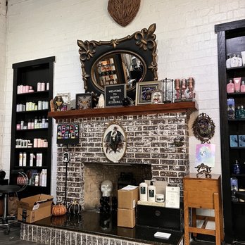 Saints N Scissors - Front desk area, unique art on display - Hair Salons Near Me - Miami, Florida