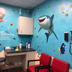 Texpress Urgent Care - Kids' room with super cute walls.