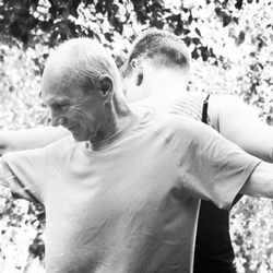 Yoga Spirit & Wellness - A.J. and Ken doing some partner yoga at our 8th birthday party.