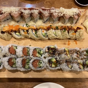 MOMO Sushi - Fire kiss on top, deep fried CA roll in the middle, spicy tuna and eel avocado on bottom - Sushi Bars Near Me - Mill Creek, Washington