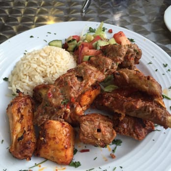 Melis Restaurant - Mixed platter - lamb shish, chicken shish, Adana, kanat, kaburga, pirzola served with rice and salad. - Mediterranean Near Me - Milton Keynes, MIK