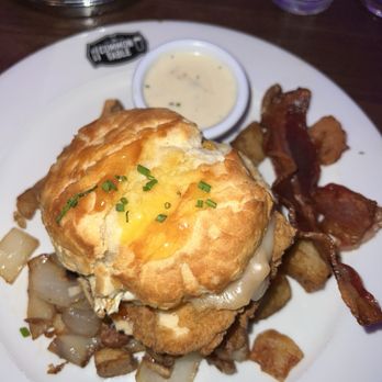 The Common Table - Smothered Breakfast Biscuit Sandwich - Breakfast & Brunch Near Me - Frisco, Texas