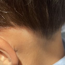 Head Hunters Barber Shop - Perfect haircut ey? Not making this review up.  Don't go here