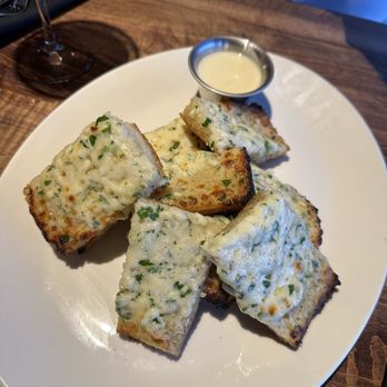 The Standard Restaurant - Garlic bread with bleu cheese sauce - American Near Me - Toledo, Ohio The Standard Restaurant - Garlic bread with bleu cheese sauce - American Near Me - Toledo, Ohio