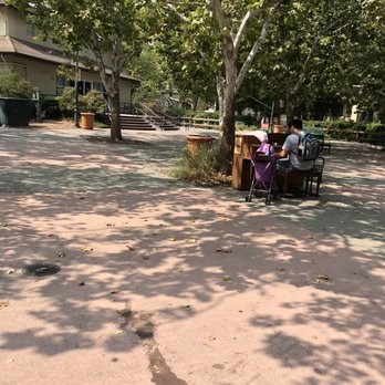 Sam's Cuisine - Central Park is right across the street. More seating if you want and it's not uncommon to catch a concert in the park. - Mediterranean Near Me - Davis, California