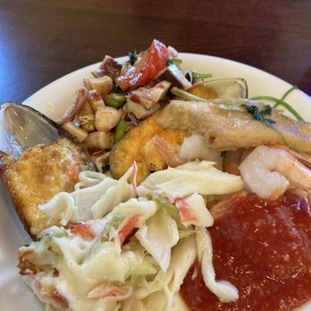 Krazy Buffet - various items on my first plate. I love shrimp and cocktail sauce. Steamed white fish and octopus salad were nicely done and appreciated. - Buffets Near Me - Las Vegas, Nevada