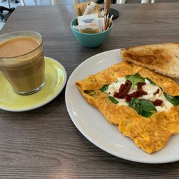 Latte and Provençal omelette Latte and Provençal omelette