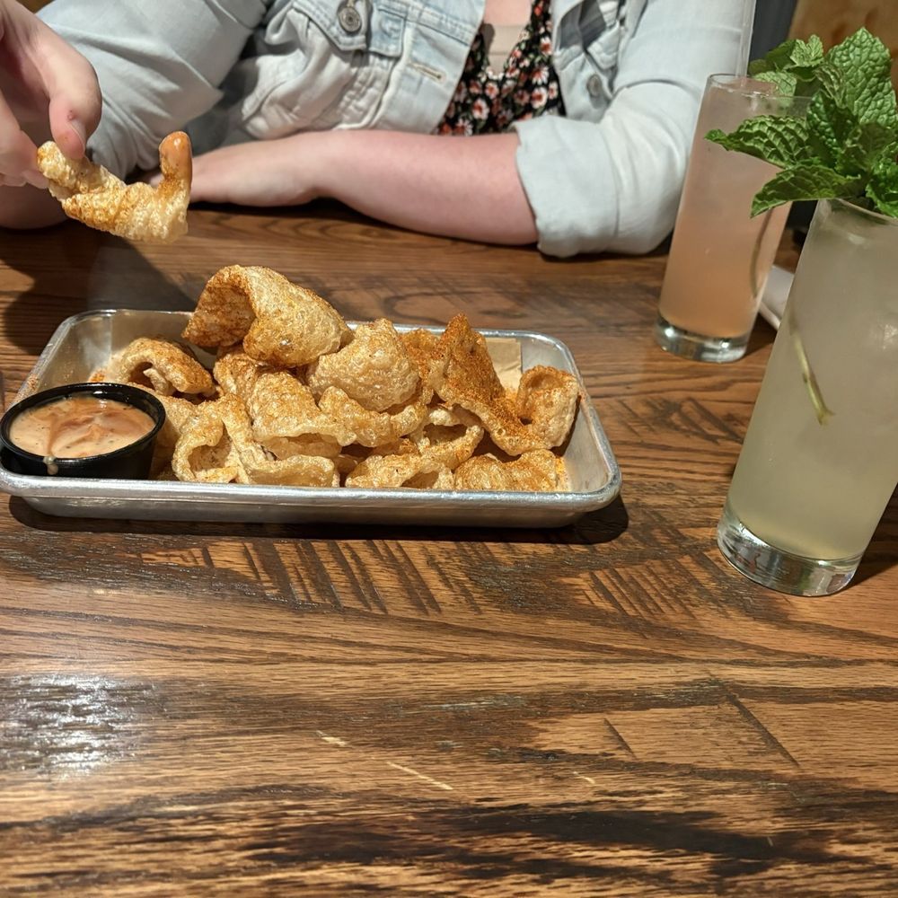 Squid Ink Eclectic Eats & Drinks - Pork skins appetizer - Gastropubs Near Me - Mobile, Alabama Squid Ink Eclectic Eats & Drinks - Pork skins appetizer - Gastropubs Near Me - Mobile, Alabama