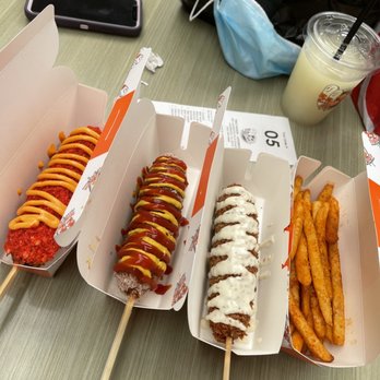 Two Hands Corn Dogs - Spicy Dog Two Hands Dog Seoul Classic Dog Kimchi Seasoning Fries - Fast Food Near Me - Lakewood, California Two Hands Corn Dogs - Spicy Dog Two Hands Dog Seoul Classic Dog Kimchi Seasoning Fries - Fast Food Near Me - Lakewood, California