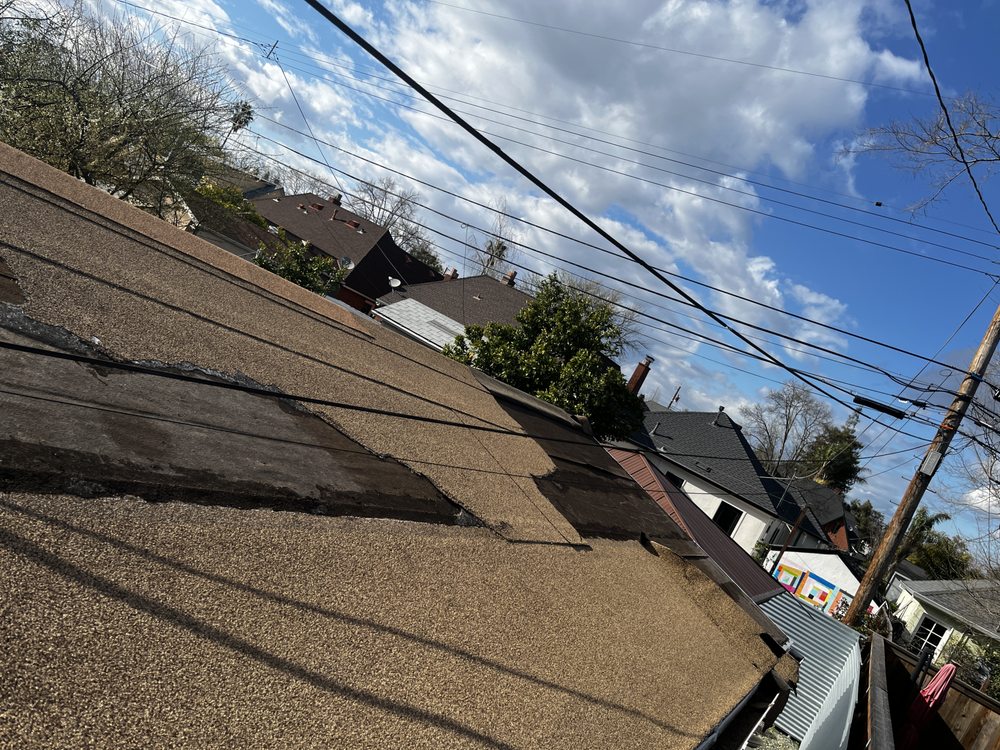 Slide of M&M Roofing