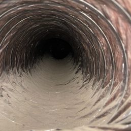 Cleaned air conditioning duct. Cleaned air conditioning duct.