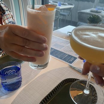 AquaGrille - Non alcoholic creamsicle and porn star cocktail - Seafood Near Me - Juno Beach, Florida AquaGrille - Non alcoholic creamsicle and porn star cocktail - Seafood Near Me - Juno Beach, Florida