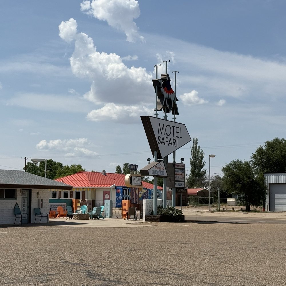 Motel Safari - A view of the sign and outdoor lounge. - Hotels Near Me - Tucumcari, New Mexico Motel Safari - A view of the sign and outdoor lounge. - Hotels Near Me - Tucumcari, New Mexico