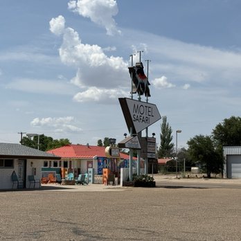 Motel Safari - A view of the sign and outdoor lounge. - Hotels Near Me - Tucumcari, New Mexico Motel Safari - A view of the sign and outdoor lounge. - Hotels Near Me - Tucumcari, New Mexico